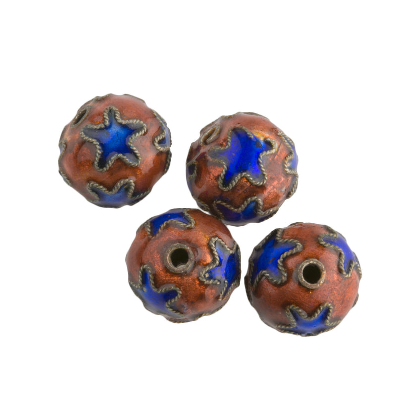 Hollow copper beads with blue stars on persimmon colored enamel. 10mm. Pkg. 2. 