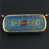 Cloisonné pendant. with blue and red enamel and gilt wire 50x23mm. Sold individually.