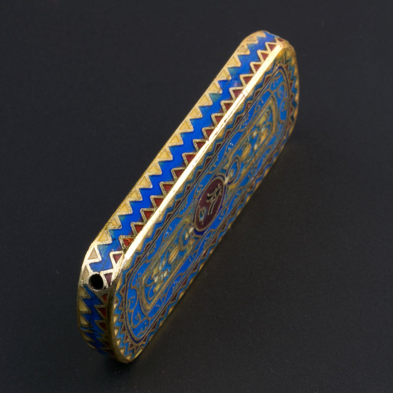 Cloisonné pendant. with blue and red enamel and gilt wire 50x23mm. Sold individually.