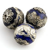 Cobalt blue enamel bead with silver Dragon encircling the bead. 18x19mm  China. Pkg.1. 