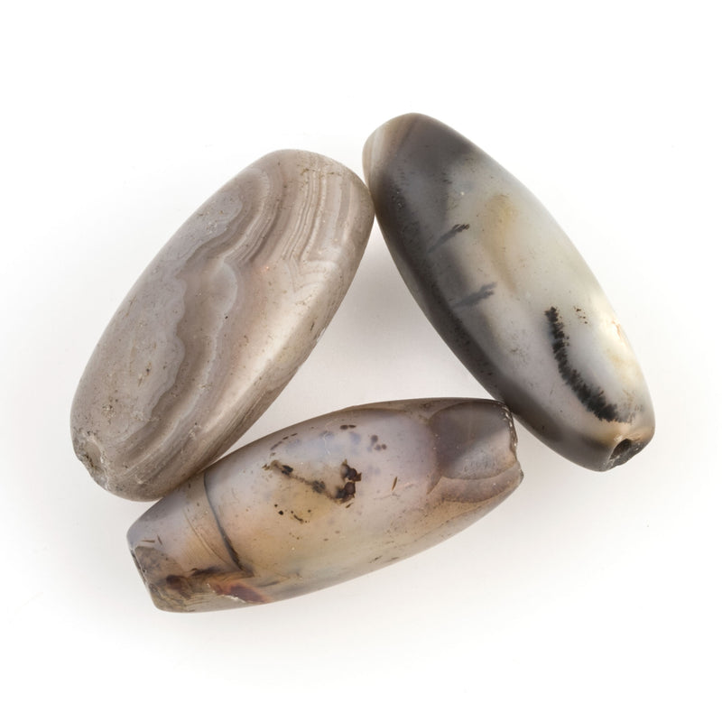 Antique agate beads in white, greys and brown from the African trade. 