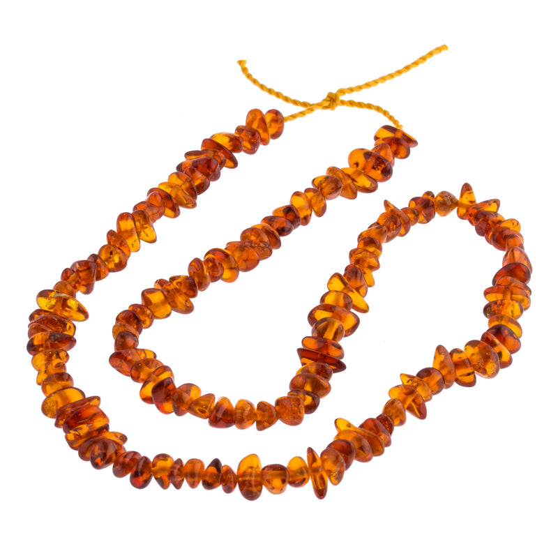 Vintage natural graduated 19.5" strand of Cognac Baltic Amber smooth polished freeform beads
