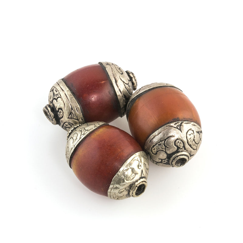 Old large Tibetan repousse sterling silver capped resin red faux amber bead. 33x26mm. 1pc. b4-amb106