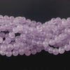Old stock natural light lavender amethyst 6mm smooth clear round beads.16 inch strand. 
