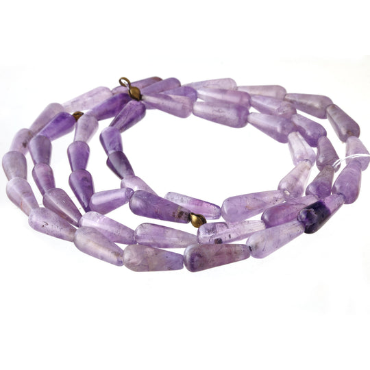 Amethyst hand cut teardrop beads. 15-16x6mm. Vintage stock, 1980s. 15.5 inch strand. 1980s. b4-ame230