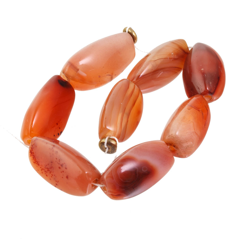 Group of old carnelian 3 sided  beads, India, 8 beads, 7 inch strand. 