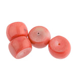 Natural bamboo coral drum bead, dyed. Salmon color. Sizes vary. 9x11mm to 12x12mm. 2 beads.