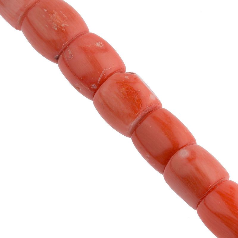 Natural bamboo coral drum bead, dyed. Salmon color. Sizes vary. 9x11mm to 12x12mm. 2 beads.