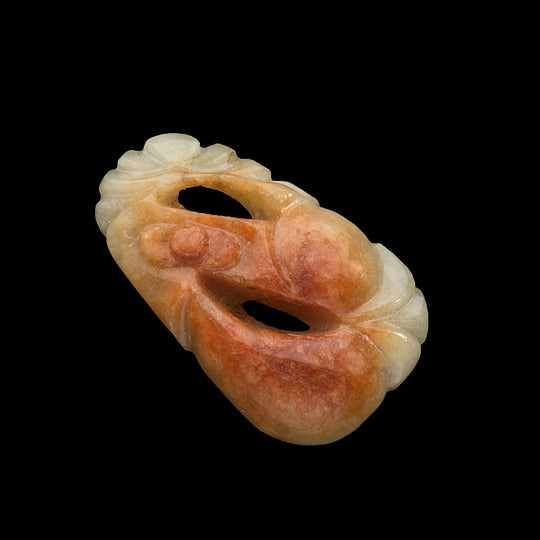 Vintage carved red and white jadeite pendant. b4-jad472