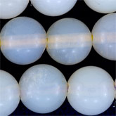 Australian opal rounds. 5mm. Pkg of 10.