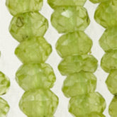 Peridot Faceted Rondelles. 2x3mm. 7" half-strand.