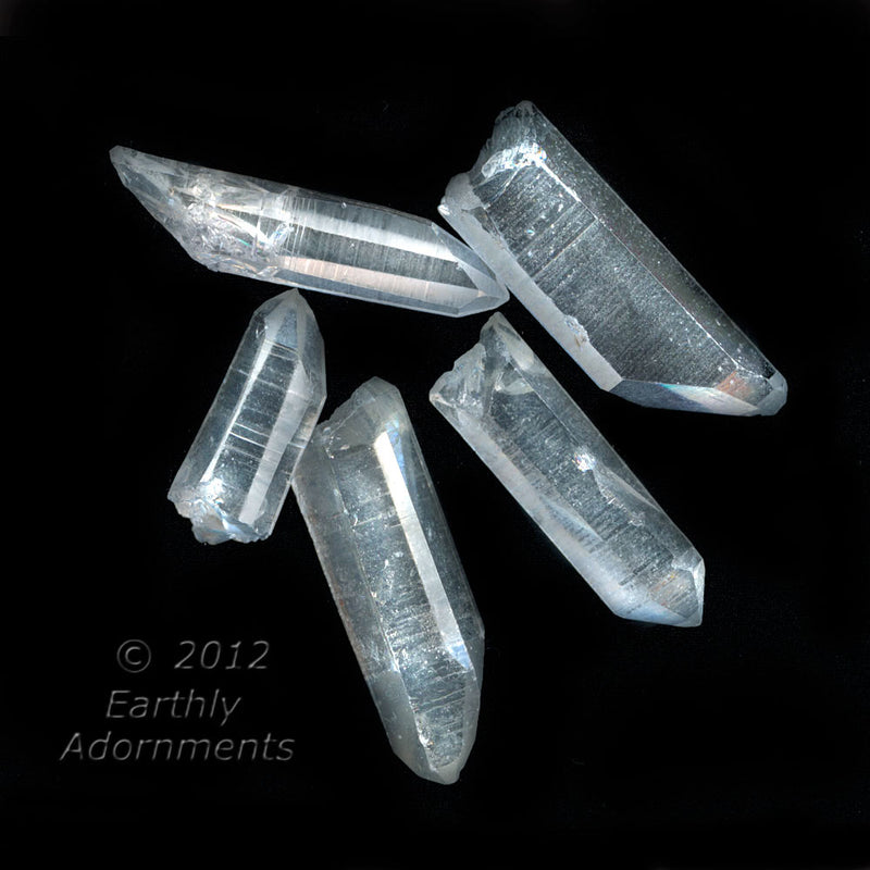 Clear quartz pointed natural crystals, some double terminated, average 20-30mm in length. 5 pcs.