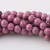 Rhodonite 4mm smooth round beads. Vintage A quality 1980s. 16 in. strand.