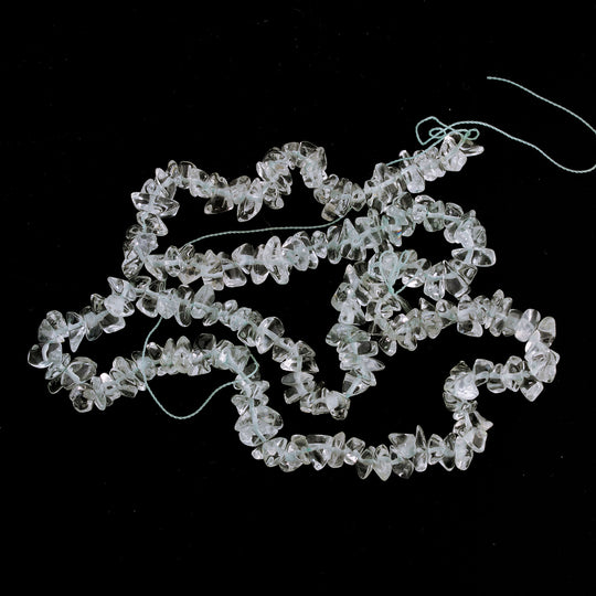 Vintage blue topaz tumbled chip beads. 6-8mm. 16" strand. B4-top101