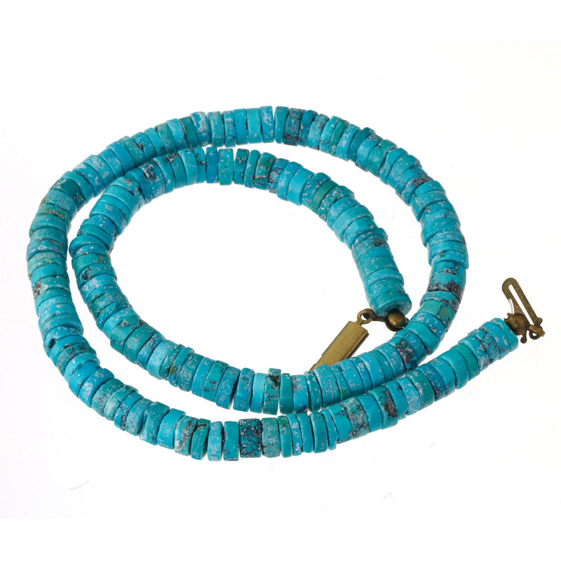 Genuine natural Southwest old stock turquoise center drilled 7mm heishi disks.16 inch strand.