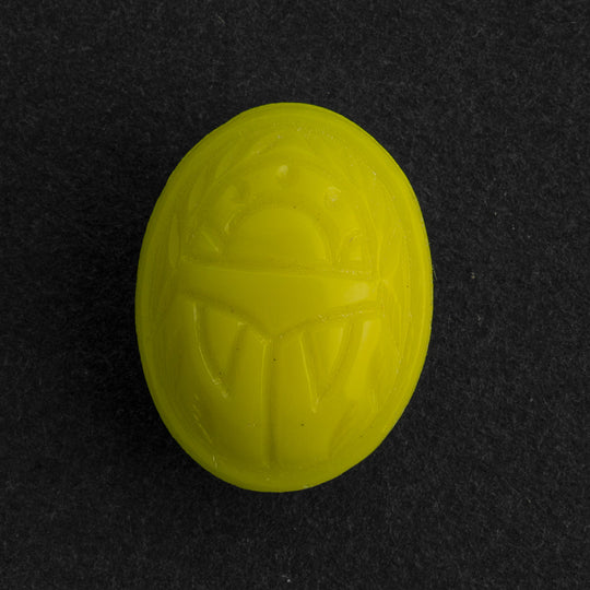 Scarab Cabochon, oval, bright yellow glass. West German. 17x13mm. Pkg 1. b5-393