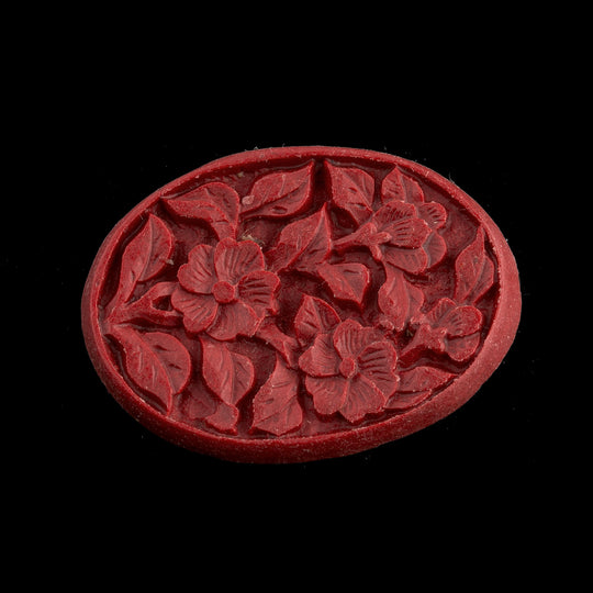 Carved cinnabar oval cabochon. 30x22mm. Pkg of 1. b5-499