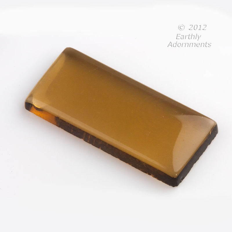 Vintage West German transparent glass flatback stone in a smoky quartz. 30x14mm