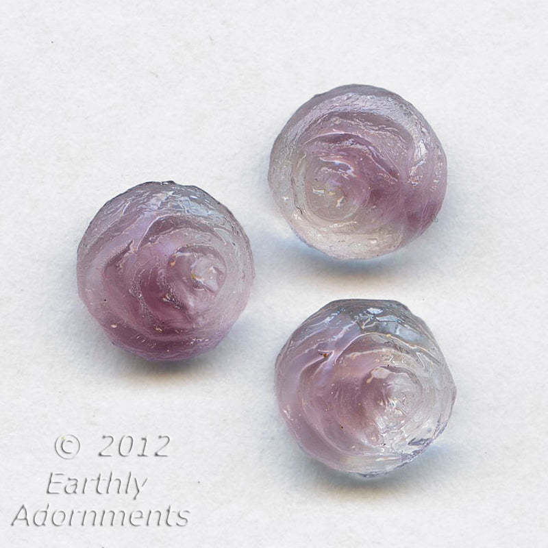 Vintage West German pressed glass cabochon in a translucent 2 tone.