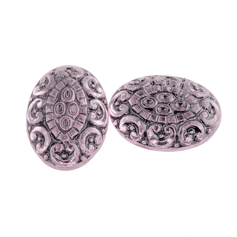 Pressed light pink foiled German glass oval cabochon with black enamel. 18x13mm.  Pkg 2.