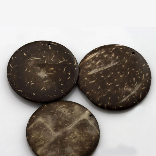 Coconut wood flat disk pendants, 30mm diameter. Pkg 4. b7-wo266