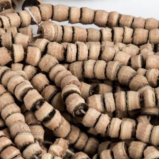 Balsa wood heishi beads. 4mm. Package of 200. b7-wo297(e)