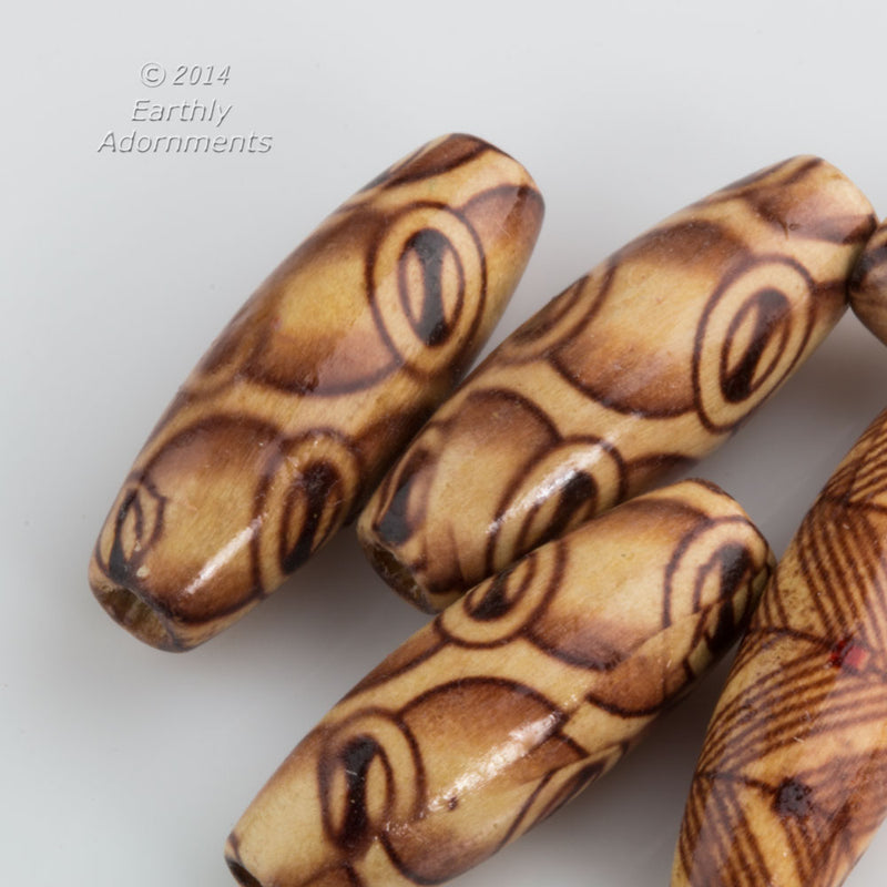 Painted wooden cylinders. 23x8mm. Package of 10.