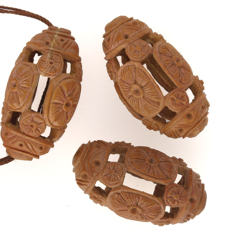 Rare Vintage Chinese carved fruit pit Hedaio bead. Sold individually