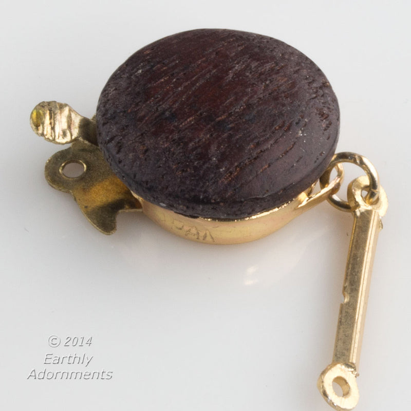 Vintage single strand push in clasp with dark wood disk. 19x15mm.