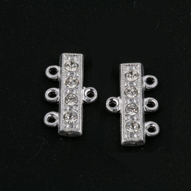 Vintage 3 ring rhodium plated rhinestone connector. Pkg of 2. 18mm wide.