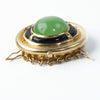 Mid-century designer 7-strand clasp of green jade, onyx and 14k yellow gold.