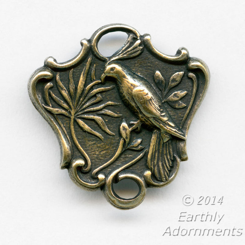Oxidized brass 2 ring connector depicting a bird on a branch. Pkg. of 2. B9-2301