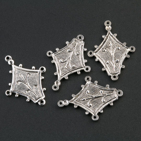 Silver plated brass 4 ring stamping, 20 x 15mm. Pkg 4. b9-0849s