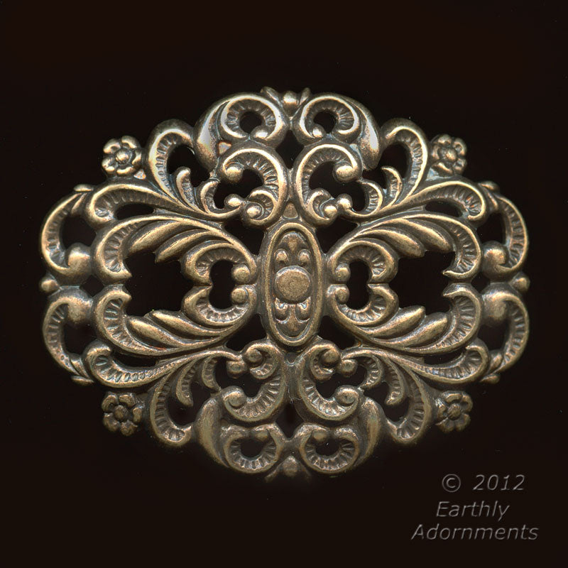 Oxidized brass stamped filigree 35x50mm sold individually.
