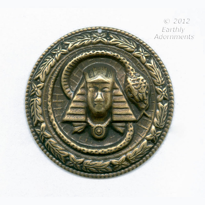 Oxidized brass Egyptian Revival style pendant. 45mm diameter. Sold invidually.