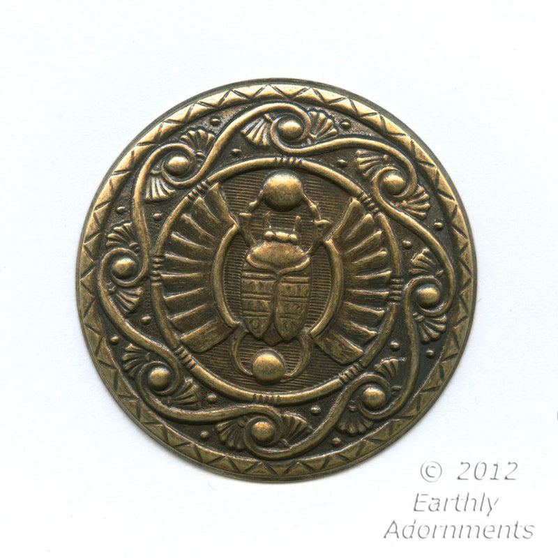 Oxidized brass Egyptian Revival style pendant. 45mm diameter. Sold individually.