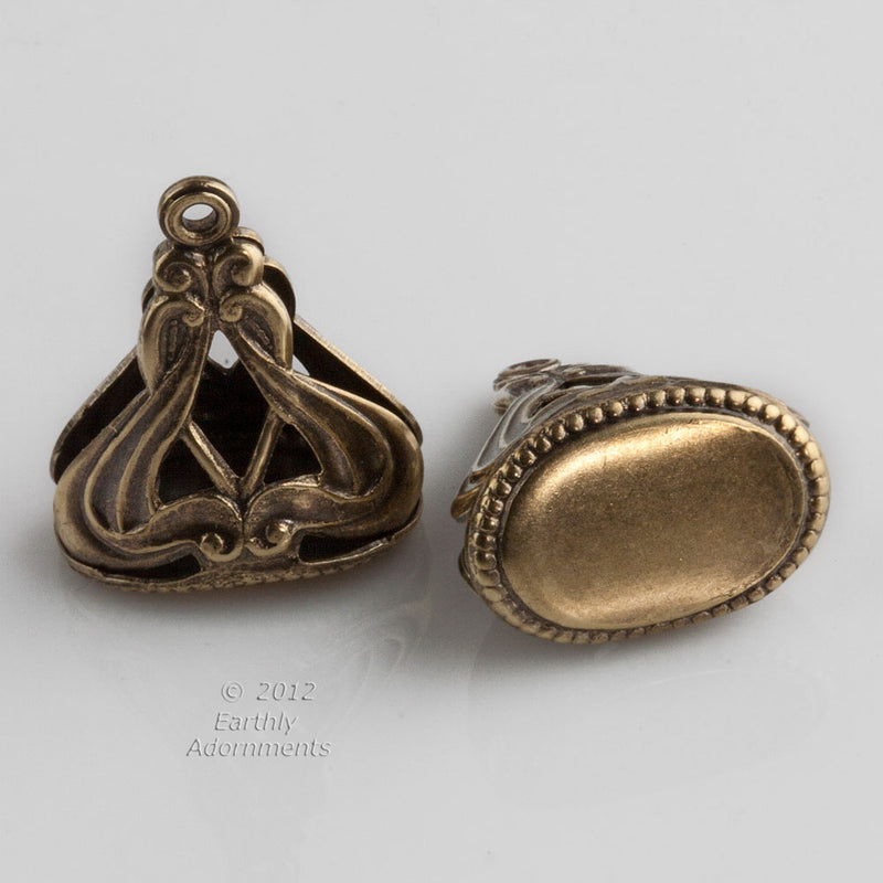 Oxidized brass fob charm 25x19x12mm sold individually.