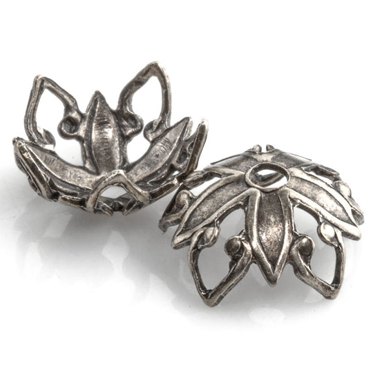 Stamped sterling silver plated brass bead cap in a floral design. 9x4mm. Package of 12. b9-2376s