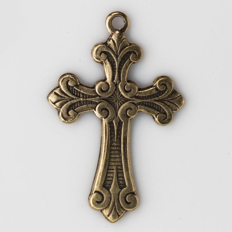 Stamped oxidized brass budded cross pendant. 39x25mm. Sold individually. b9-2379(e)