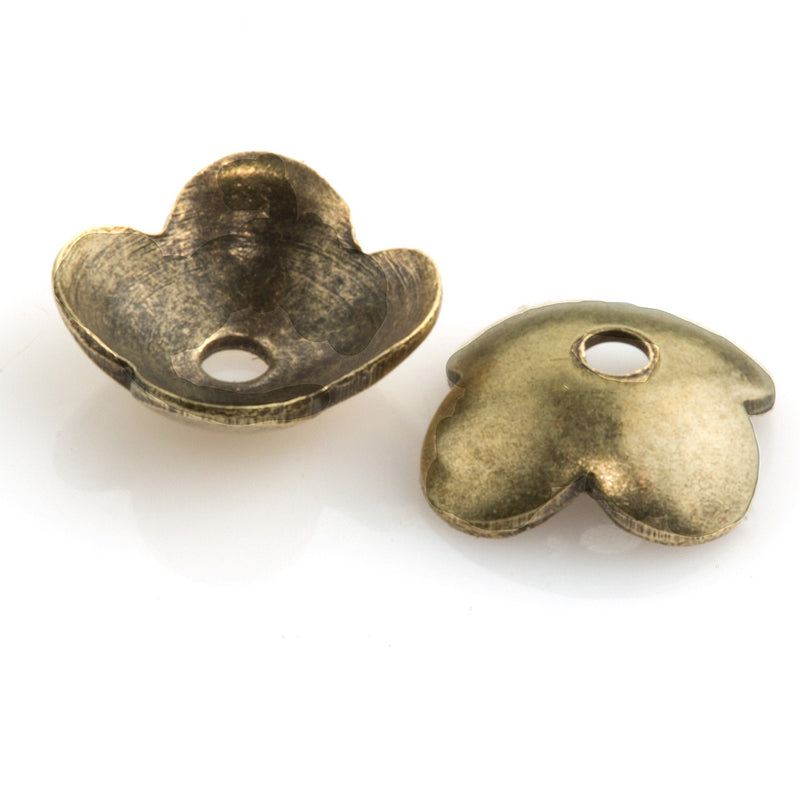 Oxidized brass four petal smooth bead cap. 6mm. Package of 12.