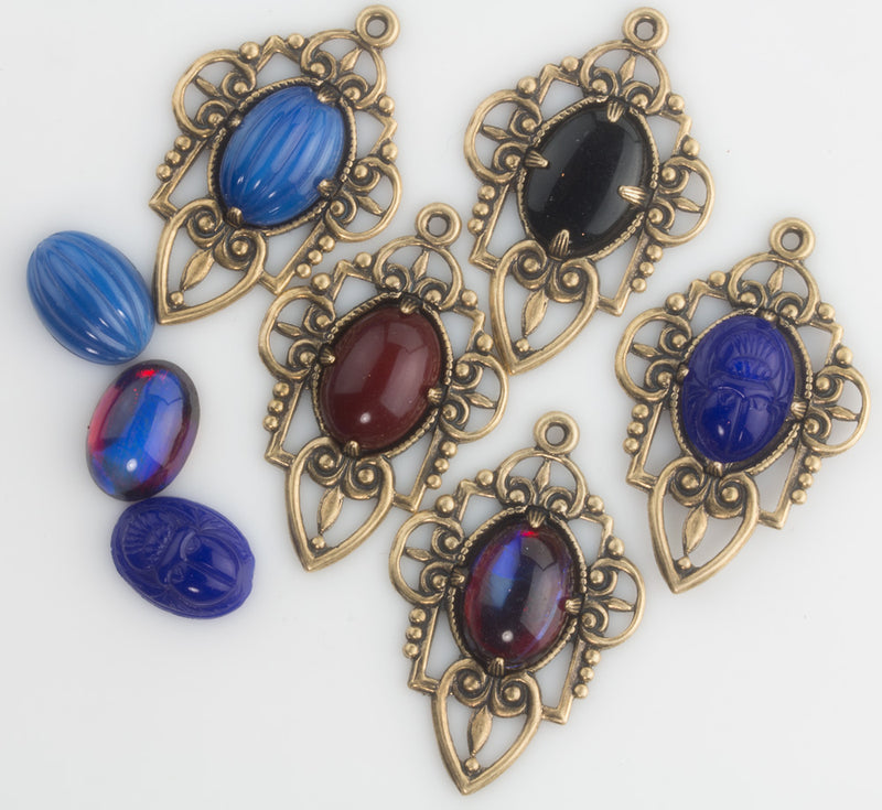 Stamped oxidized brass pronged setting for 14x10mm cabochon. 37x25mm . Package of 2.