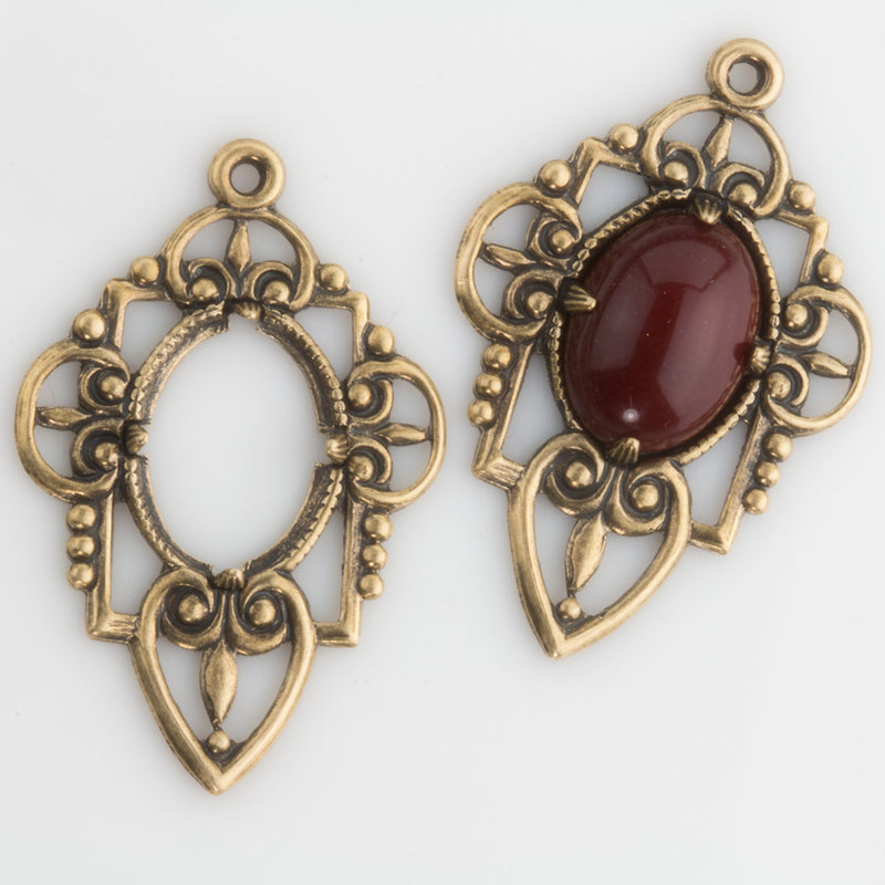 Stamped oxidized brass pronged setting for 14x10mm cabochon. 37x25mm . Package of 2.
