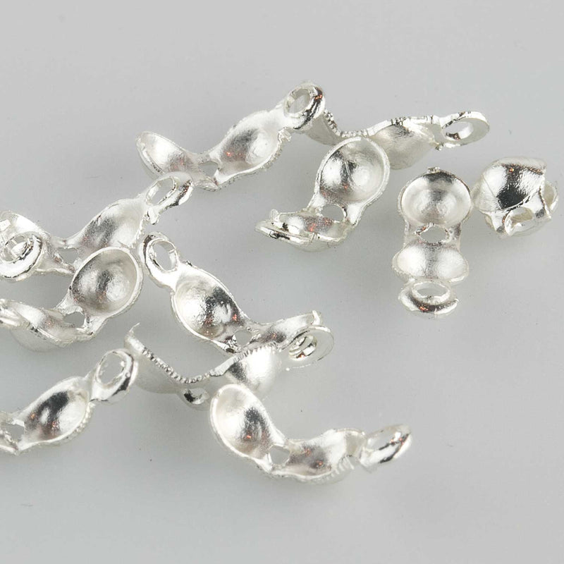 Vintage shiny silver metal clam shell beading tips. Cup size is 3.5mm. Package of 36.