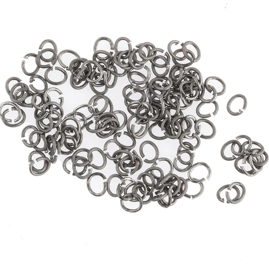 Vintage Oxidized silver plated 22 gauge 3.5mm oval open jump rings. Pkg 100.  b9-2470