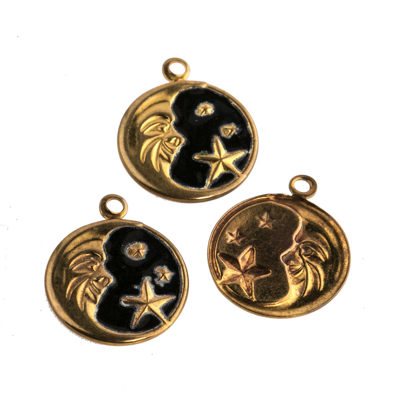 Vintage stamped brass man on the moon charm with black enamel.  13mm. 1 ring.  Pkg. 2.