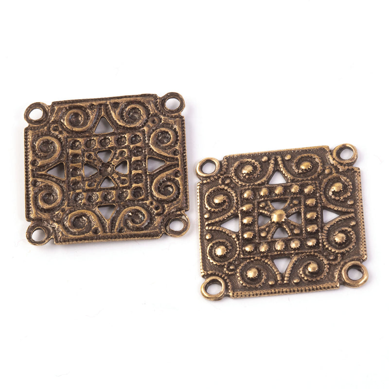 Vintage oxidized brass 4-ring stamping.  23mm square. Pkg. 2. 