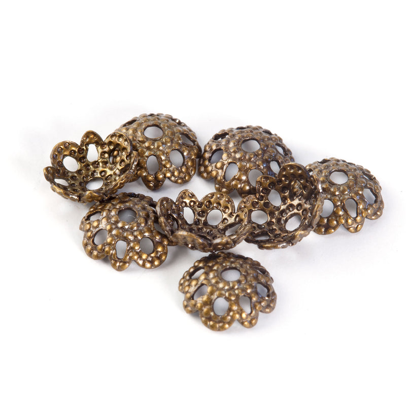 Vintage oxidized brass stamped filigree 5mm bead cap.  Package of 20.