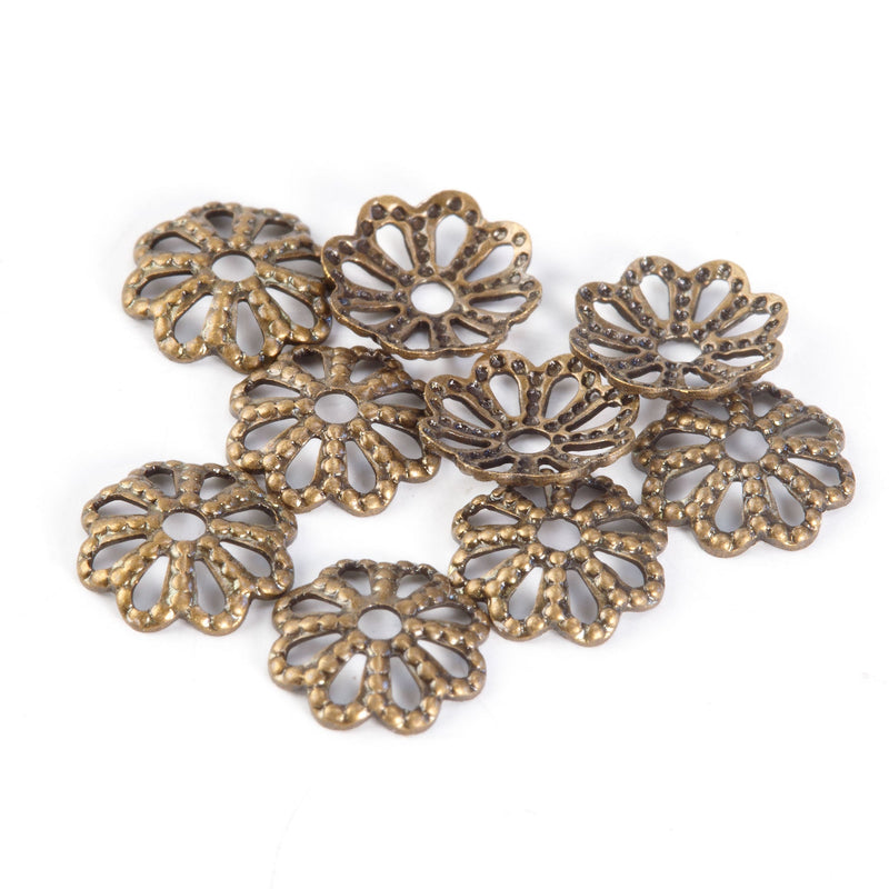 Vintage oxidized solid brass stamped filigree 8 petal 7mm bead cap.  Pkg.20. 