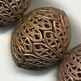 Solid brass filigree large flattened round beads, 16x20mm. Pkg of 1