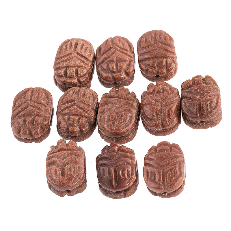 Carved Goldstone scarab beads, 18x13mm. package of 2.
